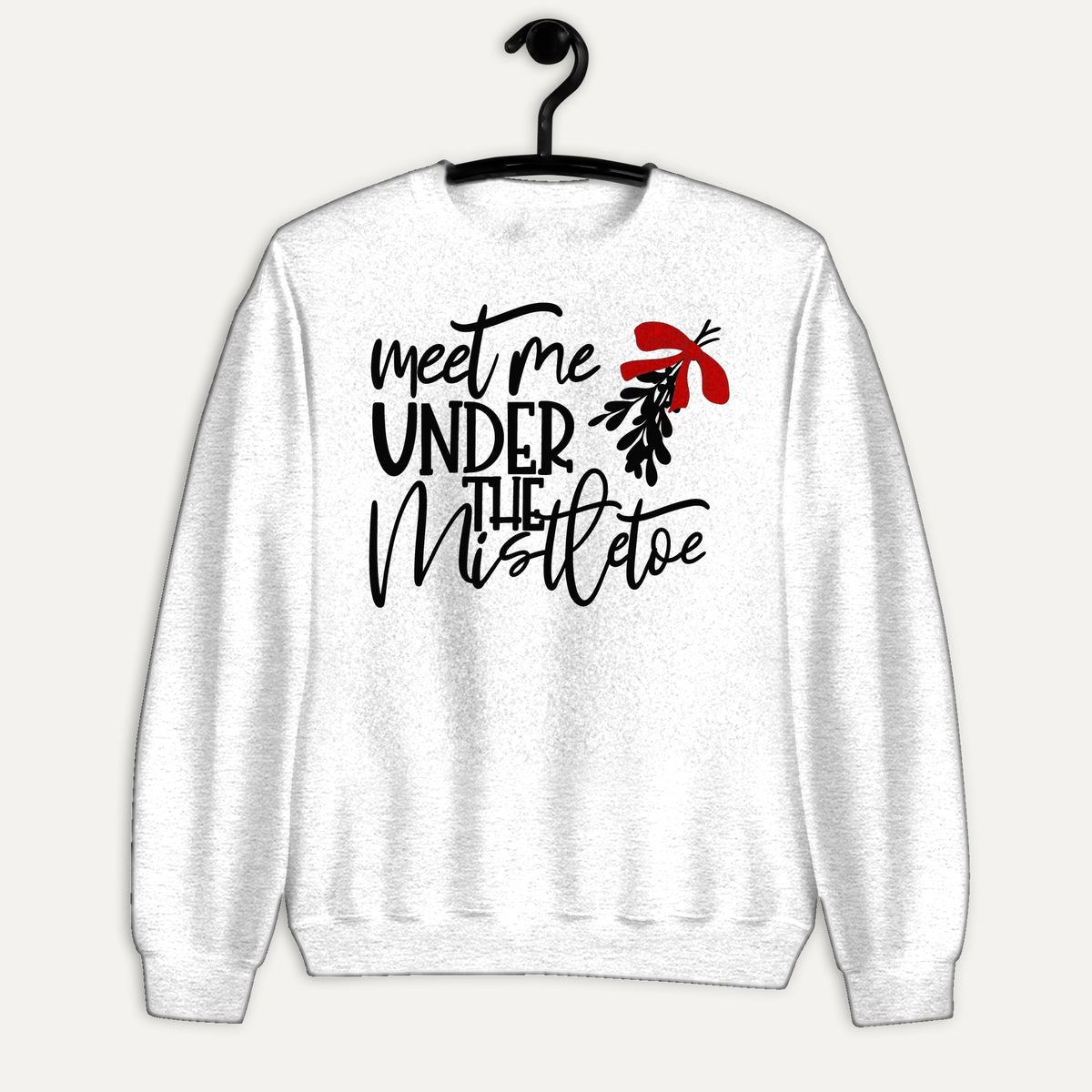 Meet Me Under The Mistletoe Unisex Long Sleeve Sweatshirt in White, on hanger