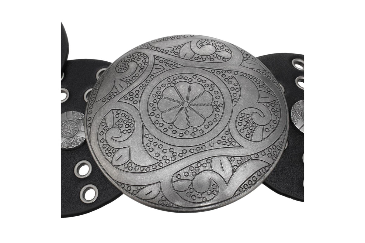 Close-up of the engraved silver-tone round buckle on the black concho belt
