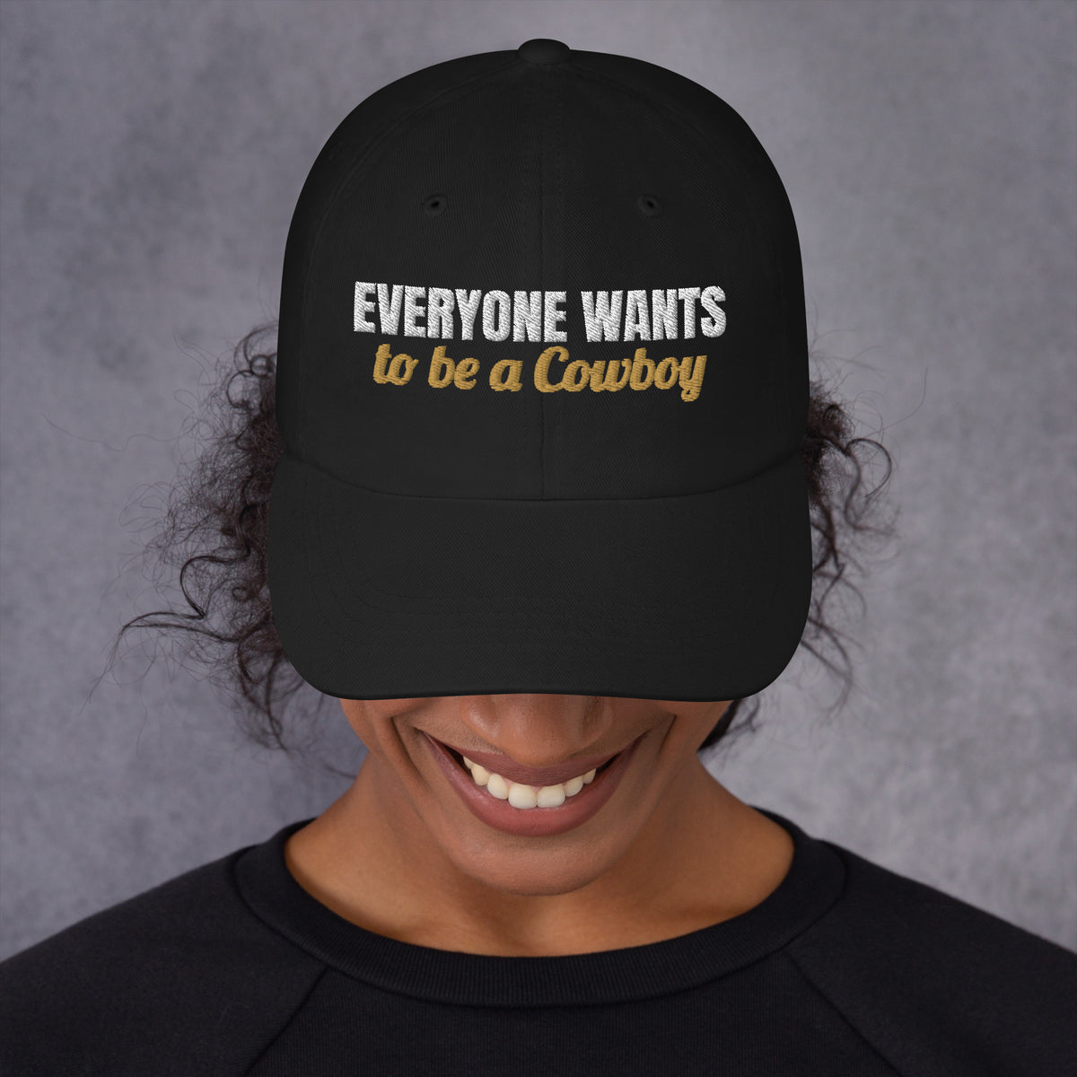 Everyone Wants To Be A Cowboy Embroidered Dad Hat in Black, front view