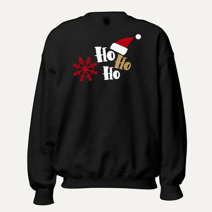 Ho Ho Ho Santa Hat And Snowflake Unisex Long Sleeve Sweatshirt in Black, front view