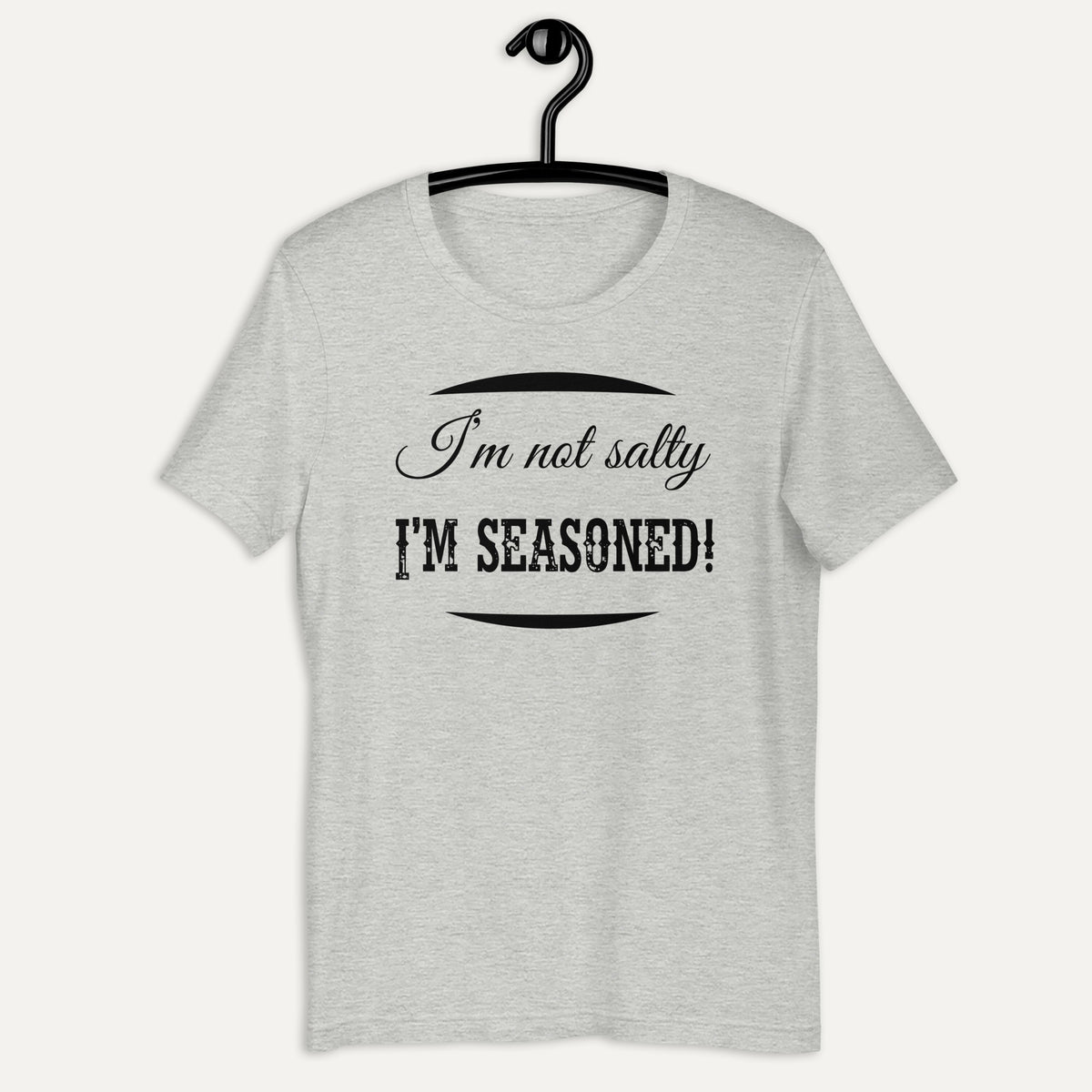 I'm Not Salty I'm Seasoned Short Sleeve Tee in Athletic Heather, on hanger