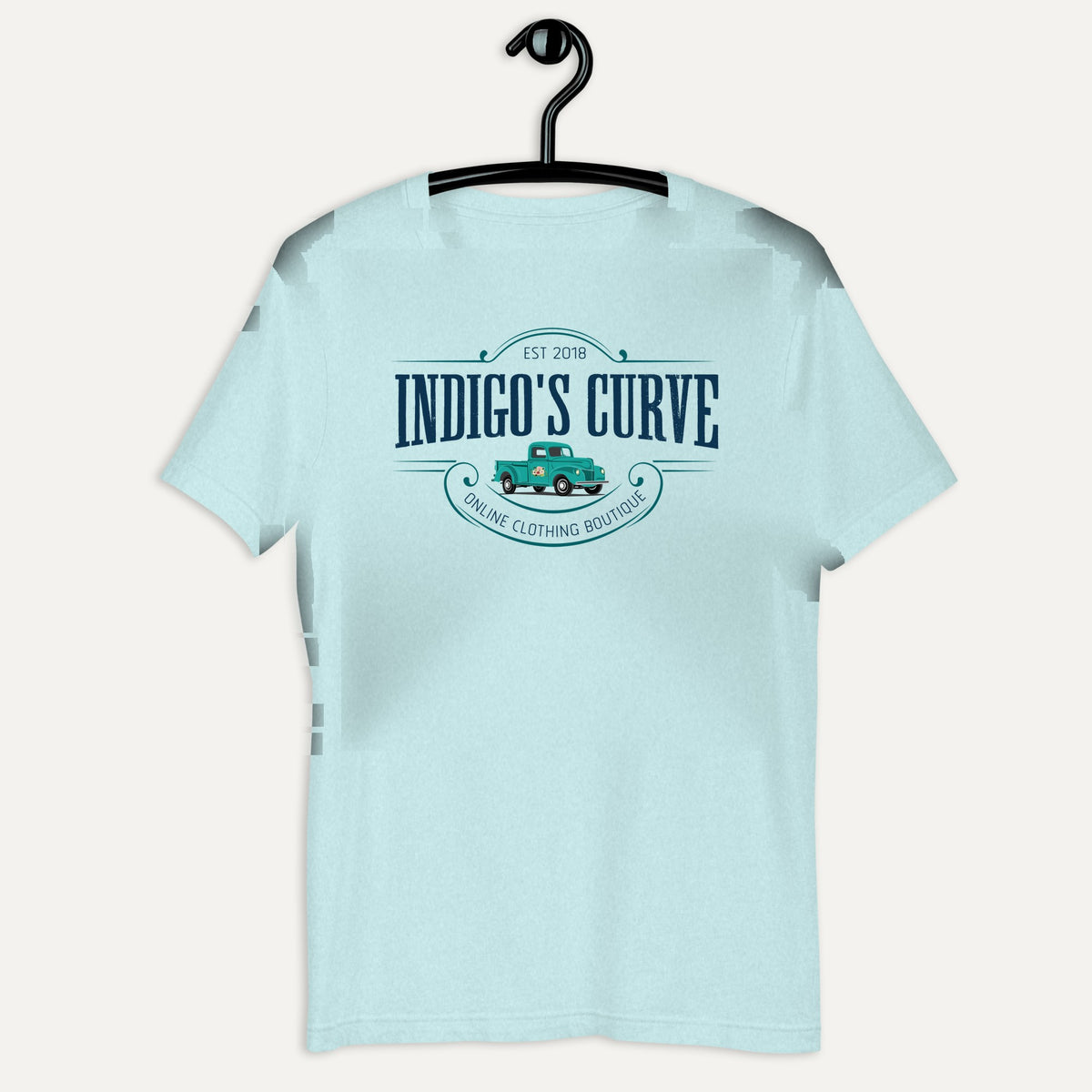 Indigo's Curve Signature Short Sleeve Tee in Heather Prism Ice Blue, on hanger