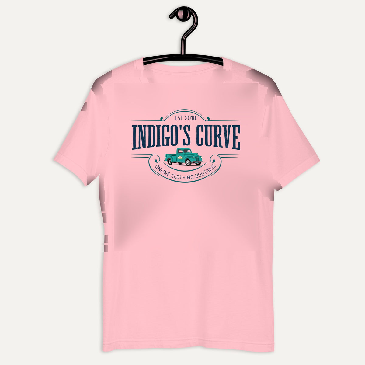 Indigo's Curve Signature Short Sleeve Tee in Pink, on hanger