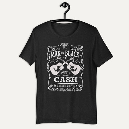 Man In Black Cash Bella Canvas 3001 Tee in Black Heather, on hanger