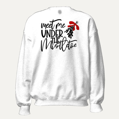Meet Me Under The Mistletoe Unisex Long Sleeve Sweatshirt in White, front view