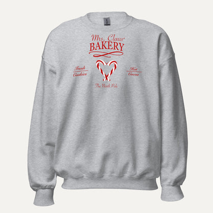 Mrs. Claus' Bakery Unisex Long Sleeve Sweatshirt in Sport Grey, front view