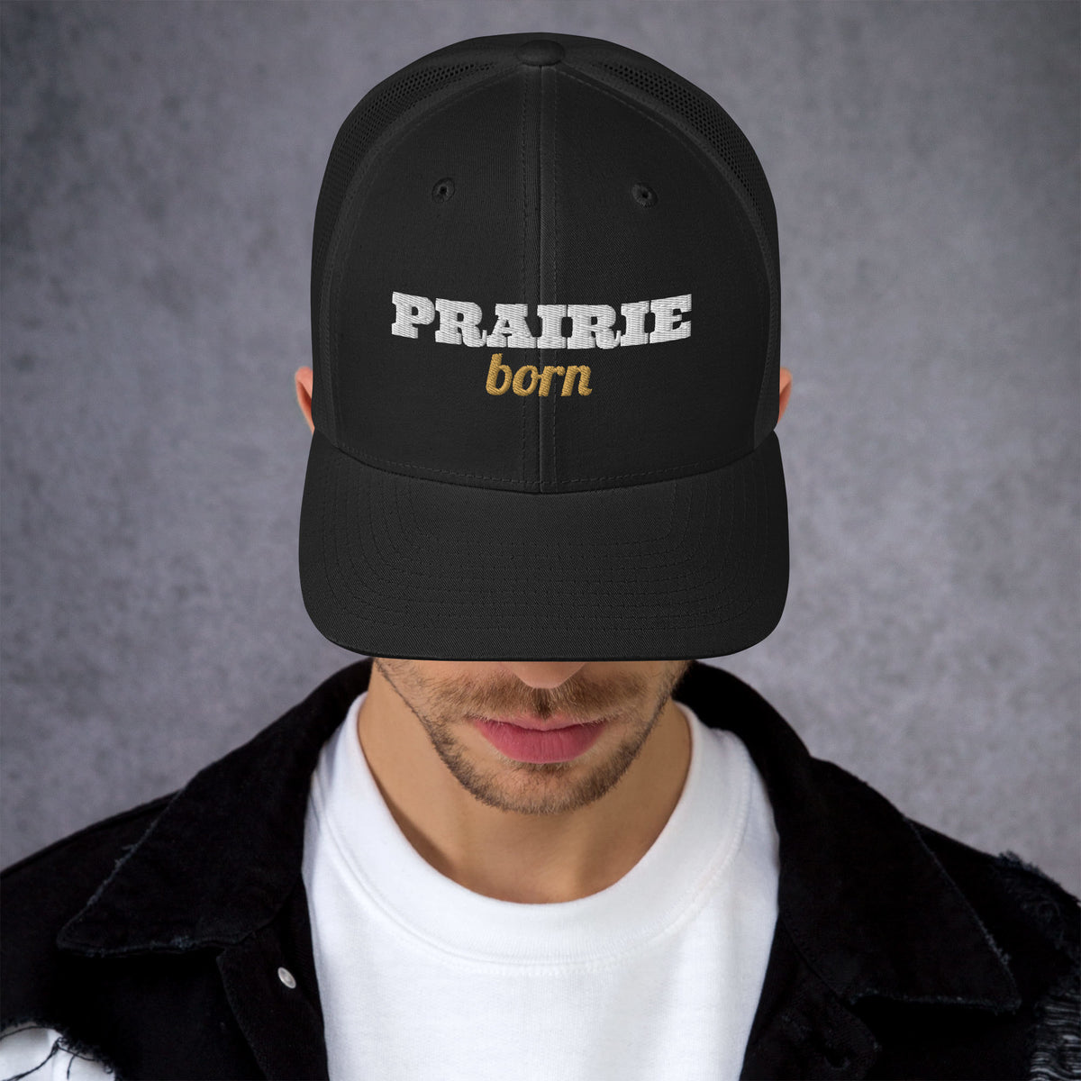 Prairie Born Embroidered Trucker Hat in Black, front view