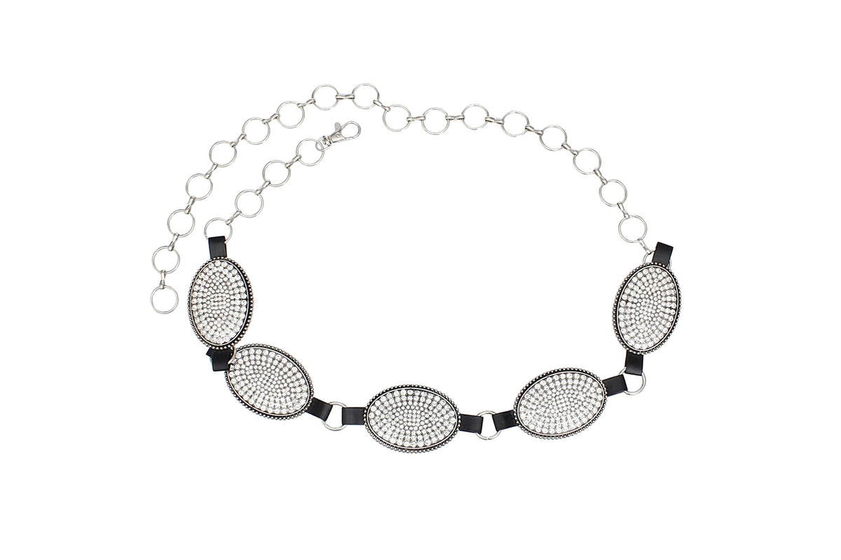 Silver-tone chain belt with rhinestone oval conchos laid flat