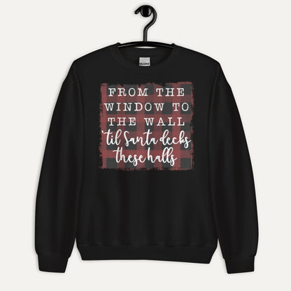 Santa Decks These Halls Unisex Long Sleeve Sweatshirt in Black, on hanger