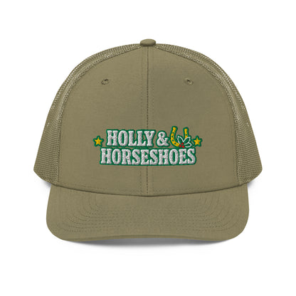 Holly & Horseshoes Embroidered Trucker Hat in Loden, front view